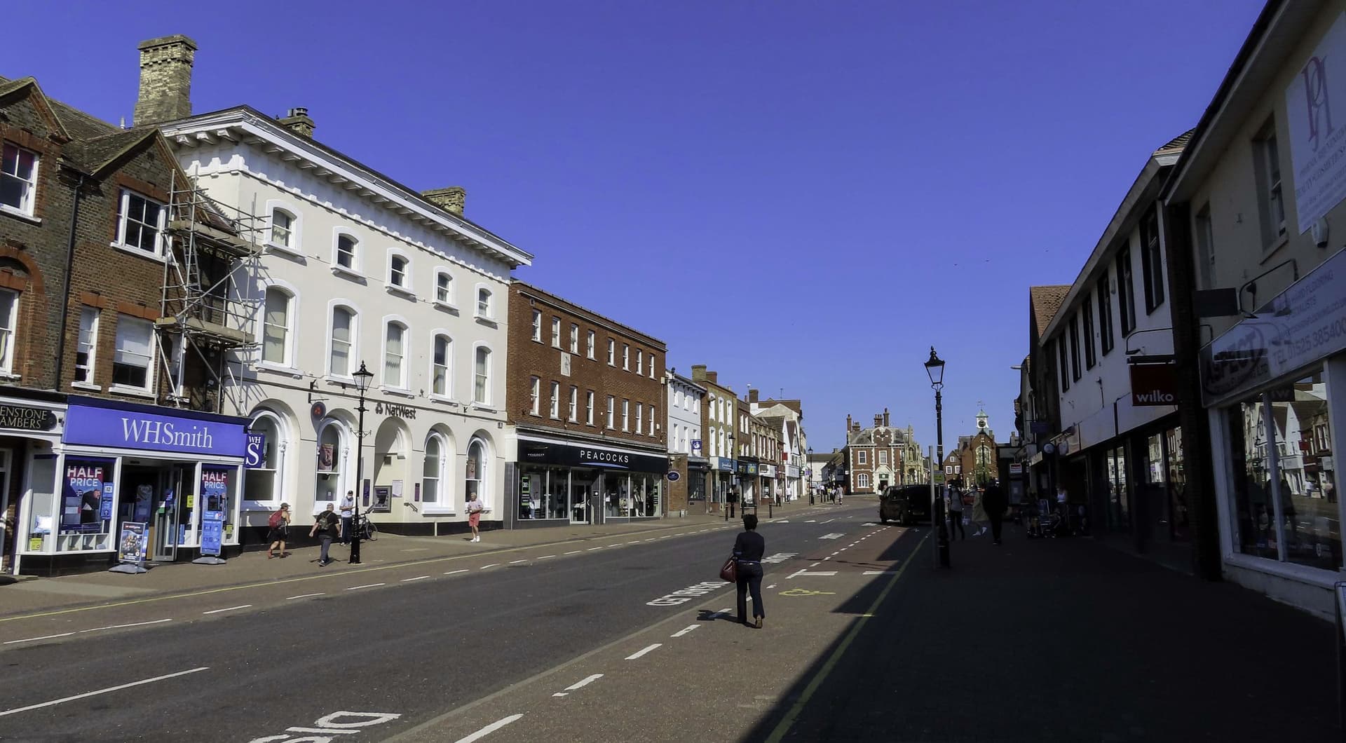 Leighton Buzzard High Street on a sunny morning, looking towards the town hall